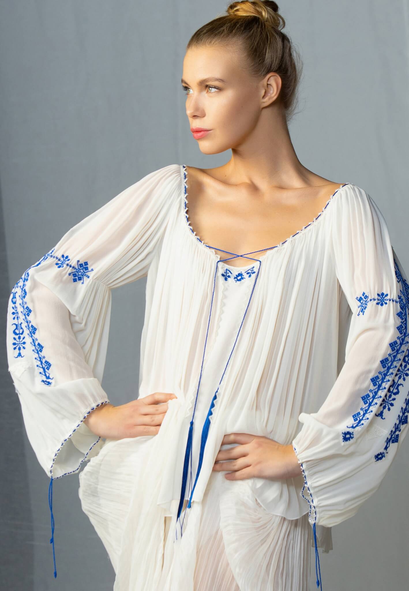 Silk blouse with blue embroidery